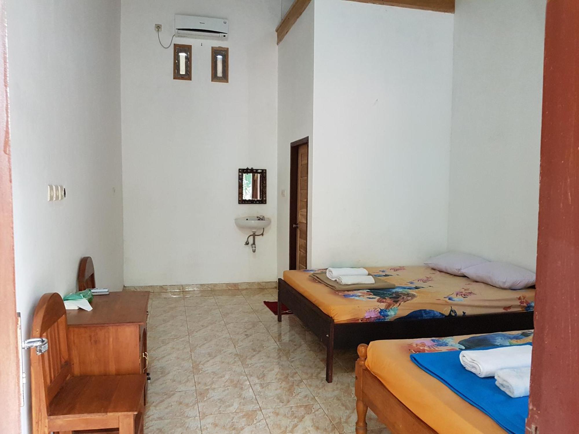 Red Island Bungalows Pasanggaran الغرفة الصورة